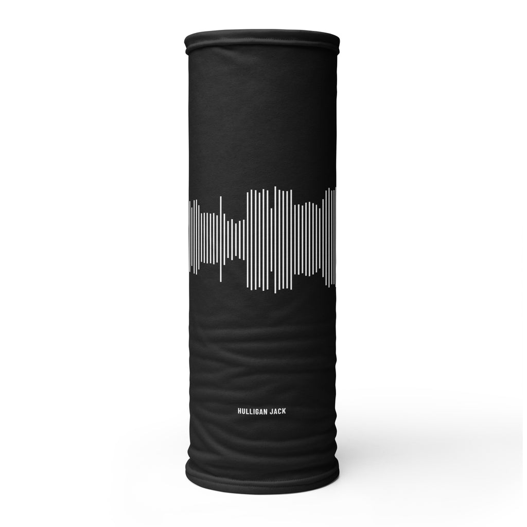 Black Session Neck Gaiter shaped as a tube, with white vertical lines around the middle and the name Hulligan Jack in small white letters near the bottom